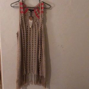 Super cute crocheted vest with fringe bottom
